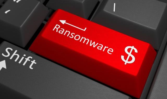 ransomware_keyboard_button_dollar-e1457434691218